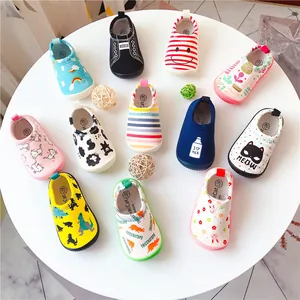 Variety of toddler slip-on canvas walking shoes with colorful cute cartoon patterns