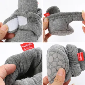 Detailed views of soft cotton baby walking shoes featuring Velcro and non-slip soles.