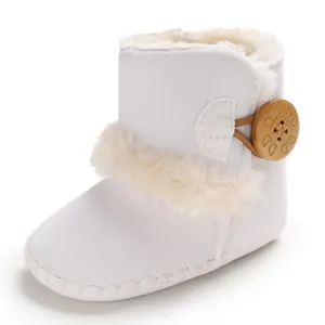 Warm white baby winter snow boots with soft fur trim and decorative wooden button