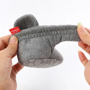Close-up showing the elastic opening of grey baby sock shoes with soft soles