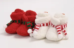 Soft fleece baby Christmas boots with decorative mini scarves and fluffy white pom-poms