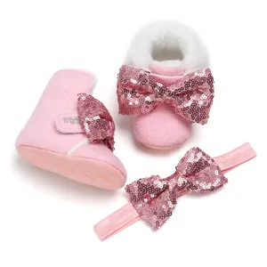Rosa flauschige Baby-Schuhe mit Pailletten-Schleife und passendem Stirnband-Set