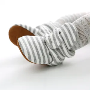 Warm grey and white striped knit baby soft sole booties for 0-1 year old infants