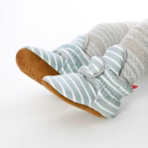 Blue and white striped soft knit baby shoes with brown non-slip soles for infants