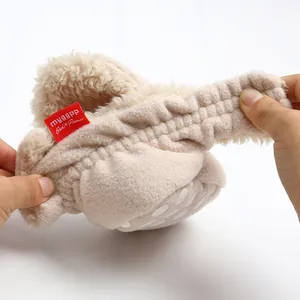 Detail of the soft fleece lining and high elasticity heel on baby walking shoes.