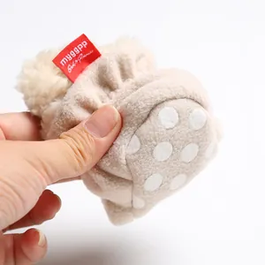 Detailed close-up of a soft sole fleece-lined baby walking boot designed for winter warmth