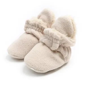 Soft fleece-lined warm beige baby booties for winter pre-walkers with non-slip sole