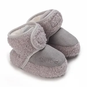 Warm grey fleece baby boots with embroidered Baby text and soft sole for infants.