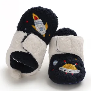 Cozy fleece baby walker shoes featuring colorful rocket and UFO embroidery detail