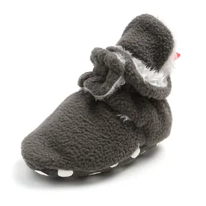 Cozy grey fleece baby booties with warm lining and soft anti-slip soles for infants.
