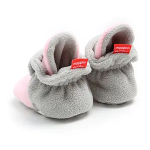 Detailed back view of soft fleece-lined baby winter boots in grey and pink.
