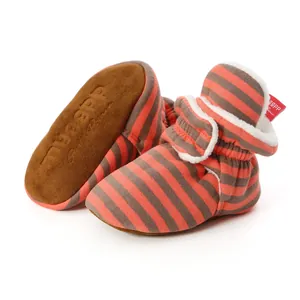 Detailed view of baby soft sole walking shoes with striped pattern and warm fleece lining