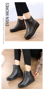 Detailansicht der rutschfesten warmen flachen Damen Stiefeletten mit Reißverschluss.