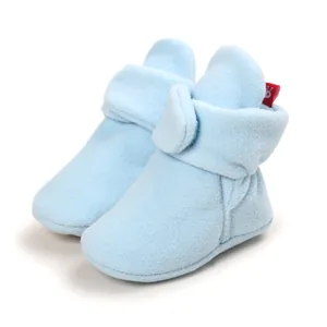 Soft and warm light blue fleece baby booties for infants and toddlers learning to walk