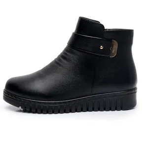 Bequeme schwarze flache Stiefeletten für ältere Damen mit rutschfester dicker Gummisohle