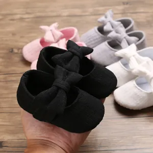 Soft-sole non-slip baby girl walking shoes with large bow details in multi-colors