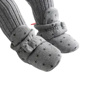 Grey baby soft sole walking booties with black star pattern for infant indoor warmth