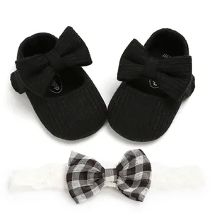 Black knitted baby girl princess shoes with matching checkered bow headband set