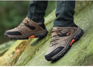 Detailed side view of durable khaki men's outdoor hiking shoes with non-slip thick soles