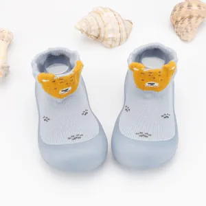 Calcetines de suelo para bebé azul claro con oso y suela de goma antideslizante para niños