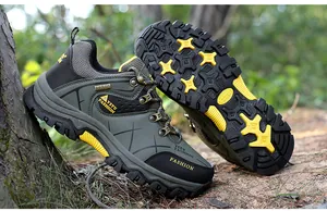 Close-up detail of the durable thick sole and anti-slip tread on men's hiking shoes