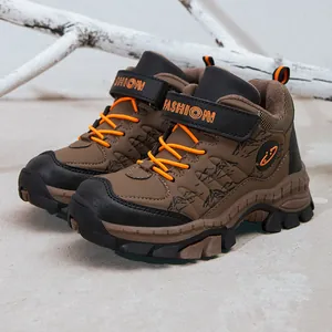 Durable boys' brown winter snow boots with thick faux fur lining and orange laces