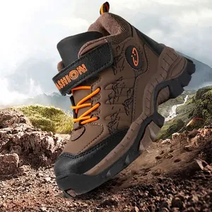 Durable boys' outdoor hiking boots featuring warm plush lining and bright orange laces
