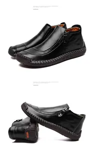 Detailweergave van de zwarte herenlederen hoge schoenen met zachte zool en stiksels.
