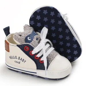 Detailed view of soft-sole baby walking shoes featuring cartoon raccoon and star pattern