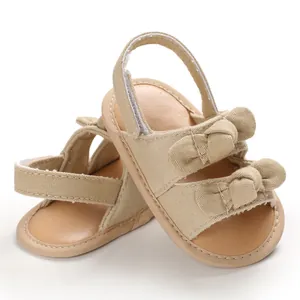 Sandales de marche beiges pour bébé avec semelles souples et jolis nœuds pour l'été