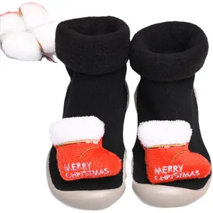 Warm black baby Christmas socks shoes with plush red boot decoration and soft rubber sole