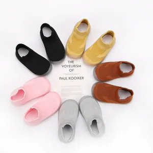 Collection of breathable baby sock shoes in multiple colors arranged in a circle for display