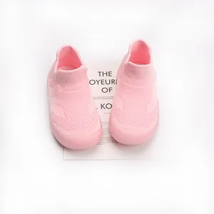 Detailed view of pink toddler sock shoes featuring breathable mesh and soft soles