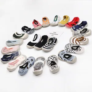 Collection of breathable baby sock shoes with various colorful patterns and soft soles