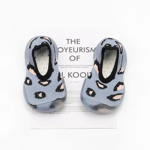 Top view of blue leopard print baby sock shoes with breathable mesh and soft rubber soles