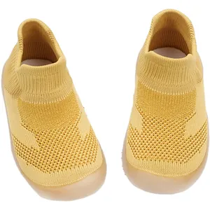 Breathable yellow knit baby sock shoes with soft non-slip soles for toddlers and infants
