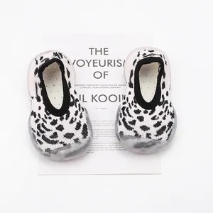 Close-up detail of breathable leopard print baby walking shoes with flexible soft rubber soles