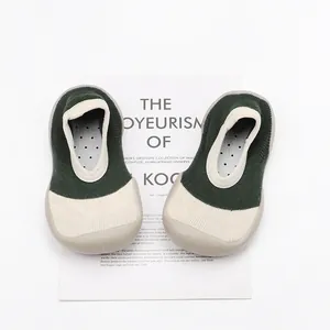 Detailed close-up of breathable knit toddler sock shoes with flexible soft rubber soles