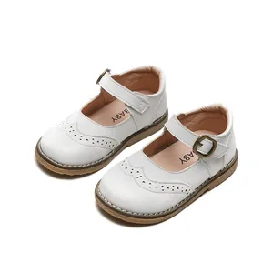 Elegant white Mary Jane leather shoes for baby girls with brogue detail and soft sole