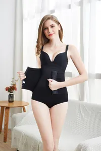 Detail of black high waist shapewear panties with three-row hook-and-eye closure
