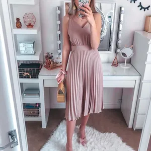 Elegant pink V-neck pleated midi dress for women, perfect for spring and summer fashion.