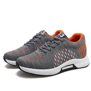 Chaussures de course pour hommes en maille grise avec talon compensé de 7 cm
