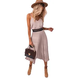 Elegant V-neck pleated midi dress with spaghetti straps for a casual summer look.