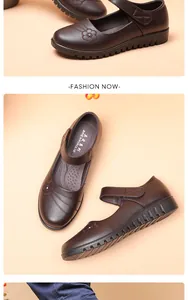 Detailed view of comfortable brown leather shoes for elderly women with flower pattern