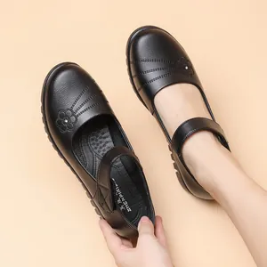 Comfortable black genuine leather non-slip flat shoes for elderly women with Velcro strap