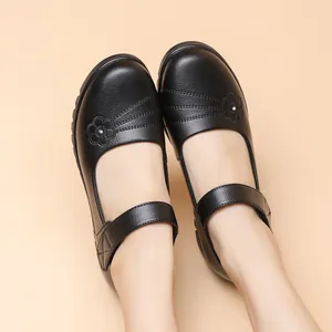 Comfortable black genuine leather Mary Jane shoes for elderly women with flower detail