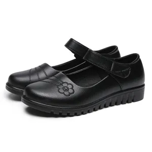 Comfortable black leather flat shoes for women with velcro strap and non-slip sole
