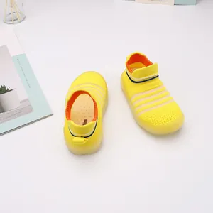 Breathable yellow knit baby sock shoes with soft non-slip soles for toddlers