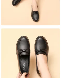 Vista detallada de cómodos mocasines de cuero negro para mujer con suela plana suave