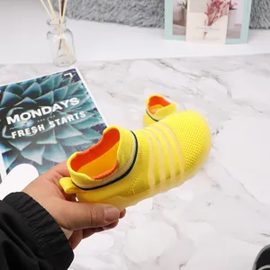 Comfortable breathable yellow 3D fly-knit baby sock shoes with soft non-slip soles